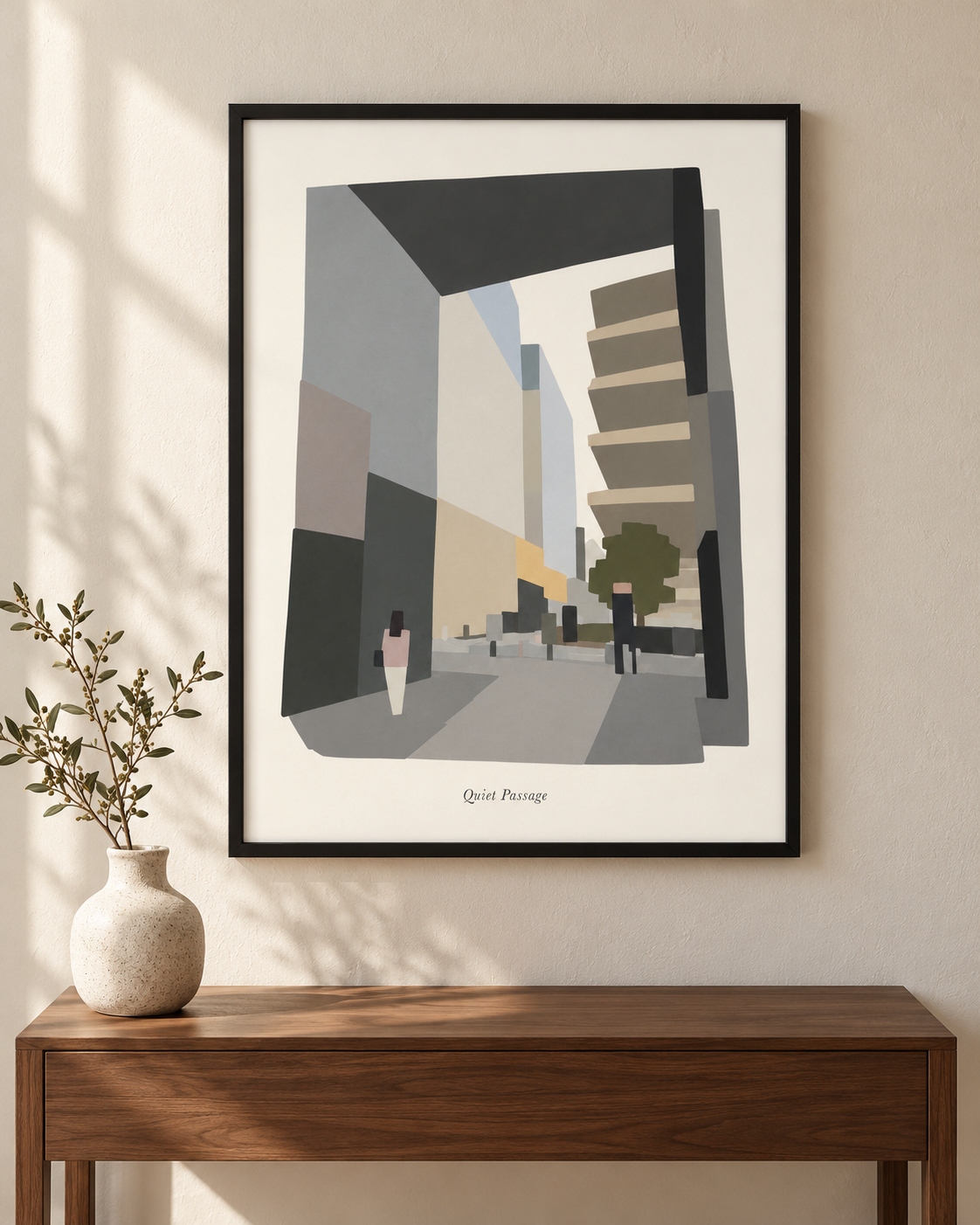 Quiet Passage, a geometric cityscape print in a black frame, shown above a wooden console in a sunlit room.